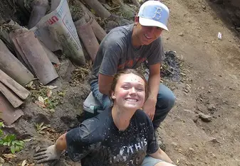 Dimitri and I after participating in the cement bucket line 