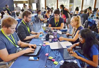 Group of students with laptops