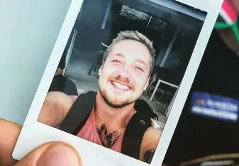 male polaroid head shot
