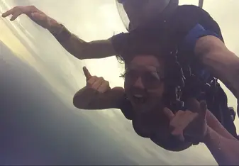 Girl skydiving.