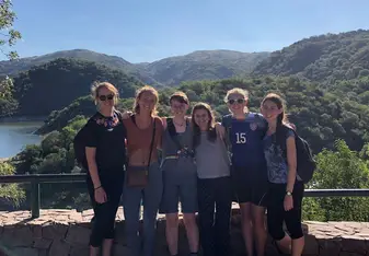 Group of girls at a mountain scenery