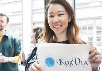 Girl holding a signage.