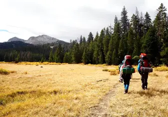 Two persons on a hike.