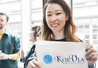 Girl holding a signage.