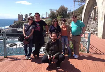 Group of people in front of ocean