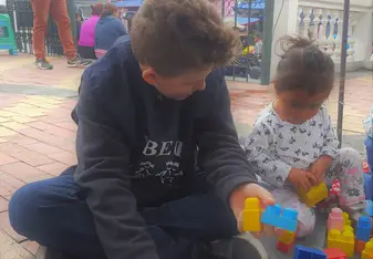 Kids playing with Lego.