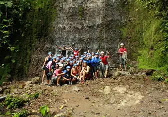 Rappelling down a waterfall