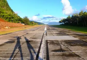 Airplane runway in Ofu with jumping shadows