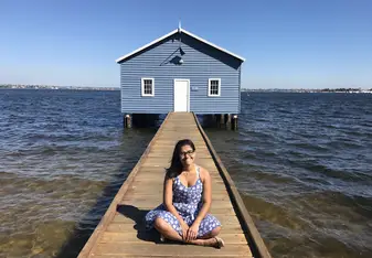 Blue sky, blue house, blue dress