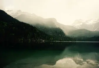 mountains lake water clouds reflection