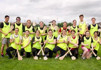 Stinters take on hurling in Kilkenny on a group excursion!