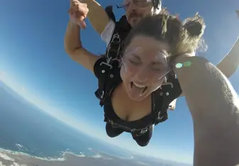 skydiving over Cape Town's ocean and mountains
