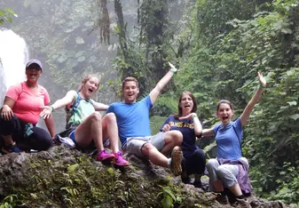 My fellow students and I climbed a giant rock in front of one of the many waterfalls at La Paz Waterfall Gardens and felt like we were kings and queens of the jungle!