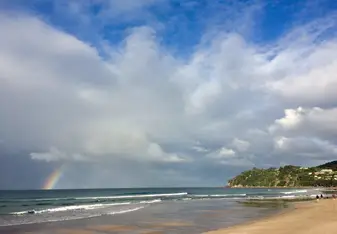 Hot Water beach in Coromandel - I’m so glad I captured the rainbow too!