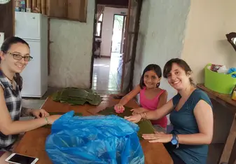 Making tamales with some friends