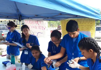 GPSA team during a health fair in Beliez