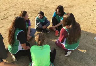 This photo shows my CIEE participant friends and I talking to a Chilean local