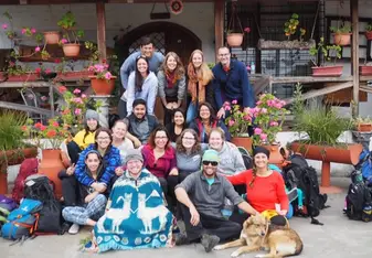 This photo was taken at the Bee Farm Shunku where we ended our trip. This is our entire group saying our goodbye to the farm, the bees and the dogs