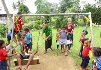 Kindergarten: play time on the swing set