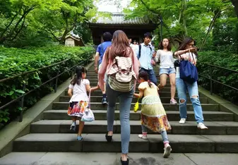 three girls walking upstairs