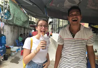 girl and man smiling and laughing