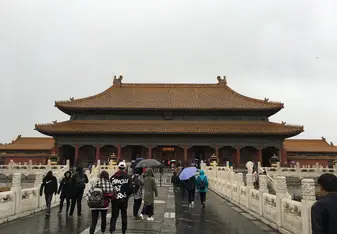 Picture of the Forbidden City - Our class visited the Forbidden City, where we saw amazing architecture and were amazed by the size of the palace. Unexpectedly, as we were exploring, it began to snow, and soon the snow began to pound down, soaking our clothes and shoes. Although the snow caught us off guard and we weren't really dressed for it, it made the experience even more memorable.  