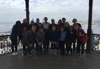 Group of students in gazebo overlooking harbor of Valparaiso