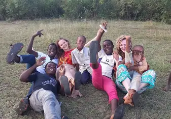 Group of people having fun on the field.