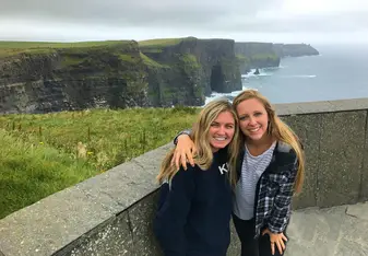two woman wearing jacket