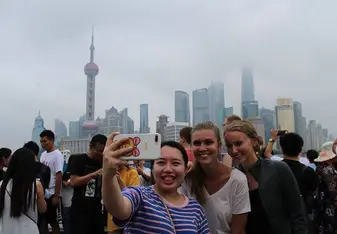 My two roommates and I in front of the Pearl Tower