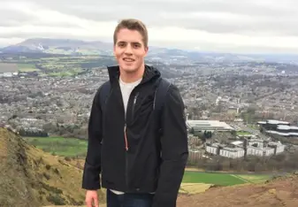 man wearing black jacket