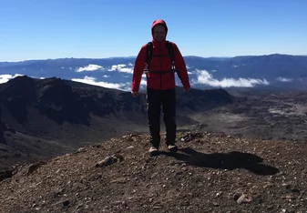 a man on top of a mountain