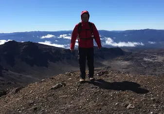 a man on top of a mountain