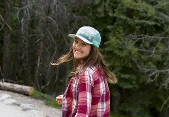 A lady posing for a photo