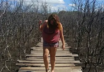 Girl at a mangrove plantation.