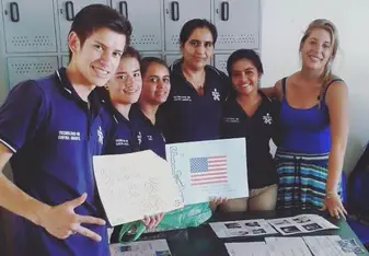 men and women wearing blue shirt