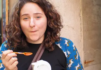 a woman with curly hair