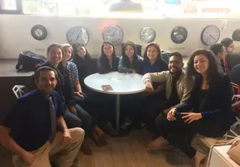 Group of people posing for a photo.