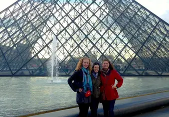 Three women at the Louvre