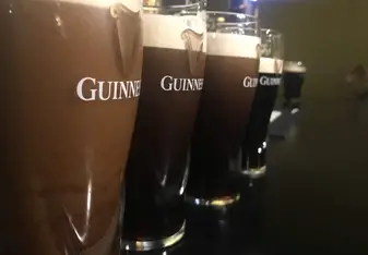 image of glasses with different colored drinks