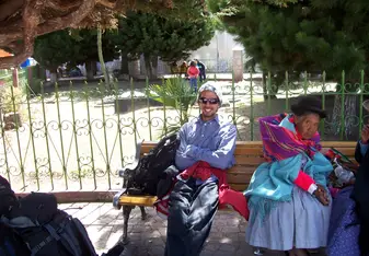 a man sitting on a bench