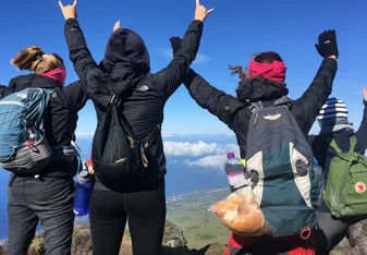 men and women mountaineer wearing backpacks