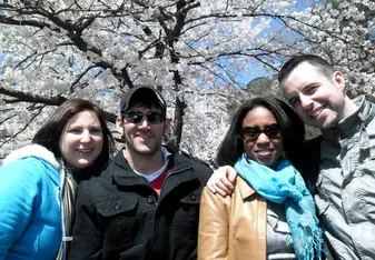 group of men and woman wearing jacket