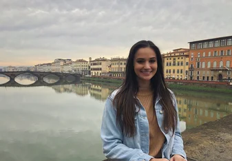 long haired woman wearing blue shirt