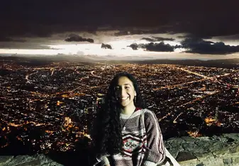 Me happily blocking a beautiful skyline 