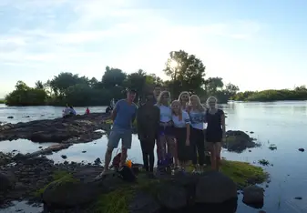 Sunset by the Zambezi River with the team