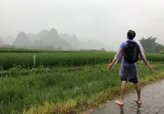 Biking through a rainstorm to see a view of the sunset 3 hours away