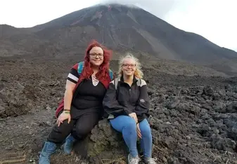 Two women at a mountain.