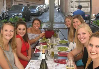 A group of women dining at a cafe.