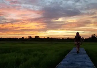 Watching the sunset on the bamboo deck